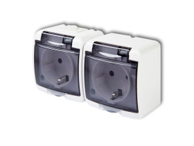 JUNIOR IP54 Gniazdo podwójne z uziemieniem schuko (klapka dymna: bez przesłon) biały GHE-2sd KARLIK