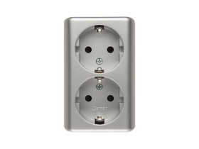 SIMON 54 Gniazdo podwójne z uziemieniem schuko natynkowe z przesłonami torów prądowych wersja skandynawska zaciski śrubowe srebr