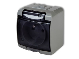 JUNIOR IP54 Gniazdo pojedyncze z uziemieniem (klapka dymna: bez przesłon) popielaty 10GHE-1d KARLIK