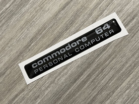 Commodore C64C black / silver badge