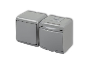 JUNIOR IP54 Wyłącznik pojedynczy z gniazdem pojedynczym z uziemieniem (klapka popielata: bez przesłon) popielaty0WGHH-1 KARLIK