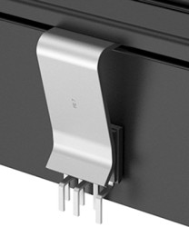 Snap-on transistor retaining clips for profile heatsinks