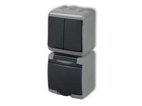 JUNIOR IP54 Wyłącznik podwójny świecznikowy z gniazdem pojedynczym z uziemieniem (klapka grafitowa: przesłony torów prądowych) p