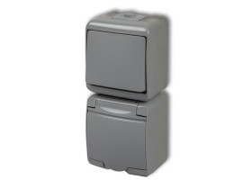 JUNIOR IP54 Wyłącznik pojedynczy z gniazdem pojedynczym z uziemieniem (klapka popielata: przesłony torów prądowych) popielaty0WG