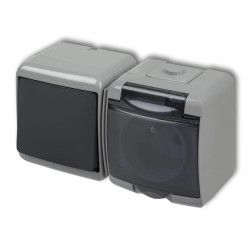 JUNIOR Łącznik jednobiegunowy z gniazdem hermetycznym (klapka dymna) popielaty / grafitowy 30WGHH-1dp