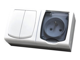 MADERA Wyłącznik podwójny świecznikowy+Gniazdo pojedyncze z uziemieniem natynkowe IP44 z klapką białe ZH-NŁ2G/00/d OSPEL