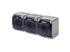 JUNIOR IP54 Gniazdo potrójne z uziemieniem z uziemieniem schuko (klapka dymna: bez przesłon) popielaty 10GHE-3sd KARLIK