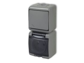 JUNIOR IP54 Wyłącznik schodowy z gniazdem pojedynczym z uziemieniem (klapka dymna: bez przesłon) popielaty0WGHP-3d KARLIK