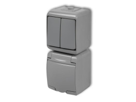 JUNIOR IP54 Wyłącznik podwójny świecznikowy z gniazdem pojedynczym z uziemieniem (klapka popielata: przesłony torów prądowych) p