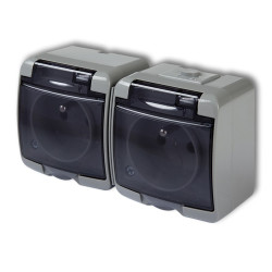 JUNIOR Gniazdo natynkowe podwójne z uziemieniem popielaty klapka dymna 10GHE-2D