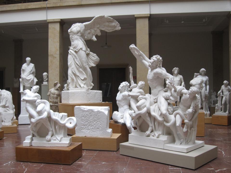 Plaster cast of Nike of Samothrace in background. Discovered in 1863, it could not have inspired Delacroix.