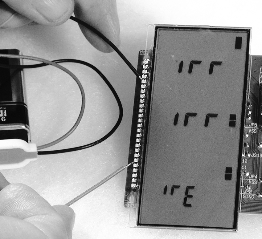 LCD elements being activated by direct battery connection.