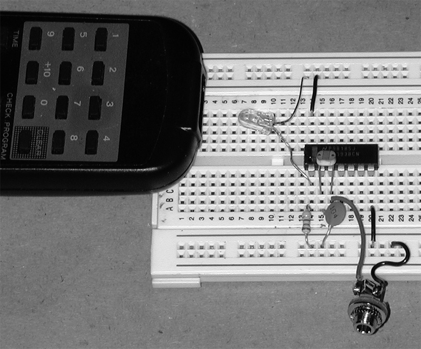 Infrared-gated oscillator with photoresistor-controlled frequency