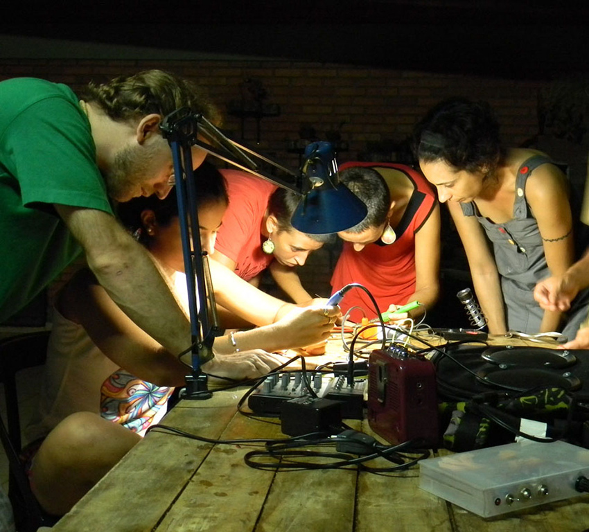 A bowl with chipá (a typical food from Paraguay and some regions of Argentina and Brazil) in a hardware hacking workshop