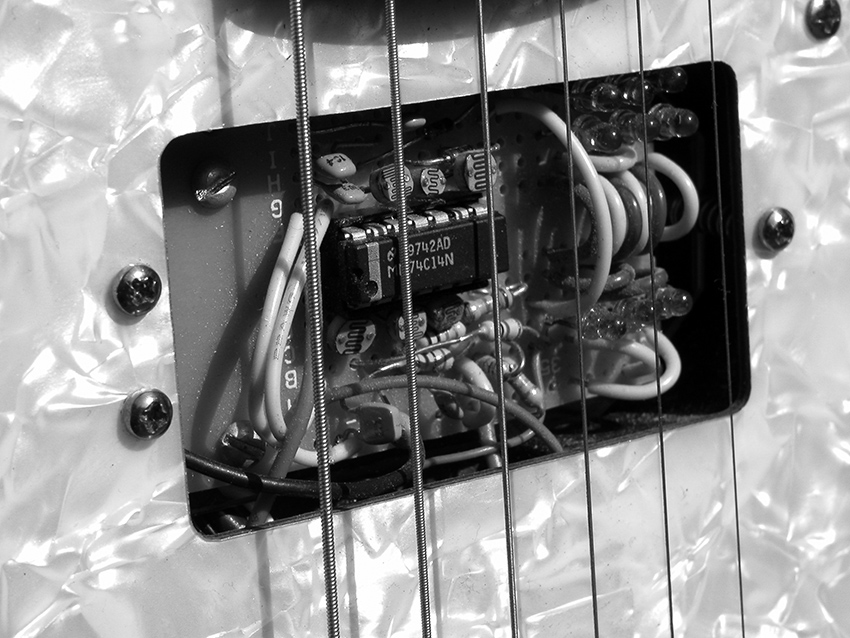 Oscillators embedded in electric guitar