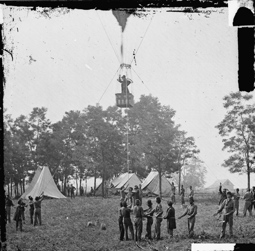 Professsor Thaddeus S. Lowe watches the Battle of Fair Oaks from his balloon, the Intrepid
