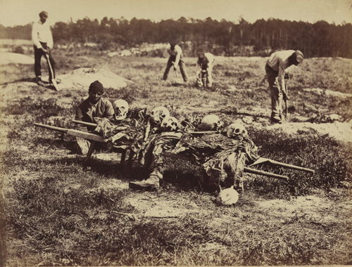 Months after the battle, a burial party collects the bones of Union soldiers who died at Cold Harbor