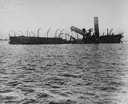 The wreckage of the Spanish cruiser Reina Cristina after the Battle of Manila Bay