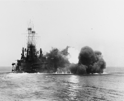 The USS Michigan firing a broadside from her eight main guns