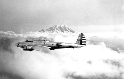 An XB-17 on one of its early flights, with Seattle's Mount Rainier in the background