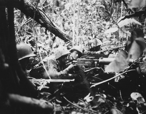 Marines man a .30 caliber Browning machine gun