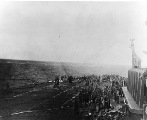 A view of the USS Lexington's flight deck as her men prepare to abandon ship after several bomb and torpedo hits disabled the ship
