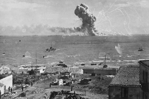Looking from Gela, the American liberty ship Robert Rowan explodes after being hit by a German bomb