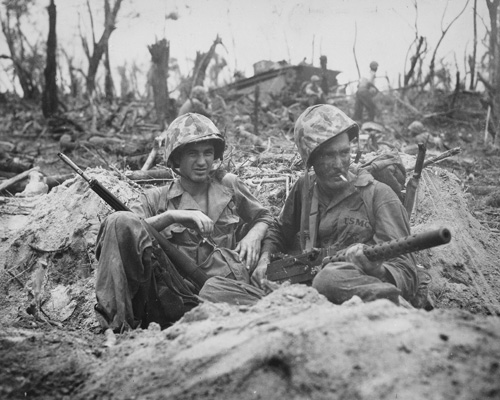 Marines Gerald P. Thursby and Douglas Lightheart during mop-up operations on Peleliu