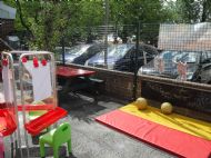 The children mark make in the garden area!
