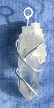 Silver setting for quartz crystal