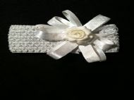 white bow with white flower on 1.5in white hairband
