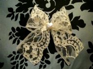 ivory bow with ivory heart