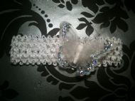 white hairband with white and silver butterfly