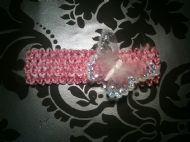 pink hairband with white and silver butterfly