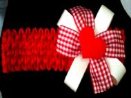 red hairband with white and red cheque bow and heart centre