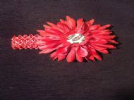 red hairband with red flower