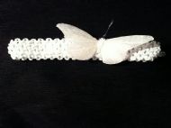 white hairband with large white buterfly