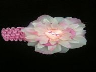 pink hairband with white and pink flower and heart centre