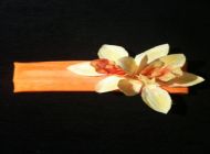 orange hairband with orchids