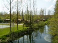 cabins by the river at St-Aulaye