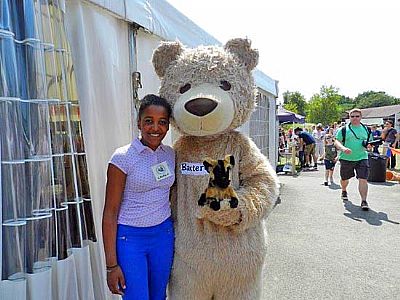 volunteer lauren pictured here with the famous baxter bear 
