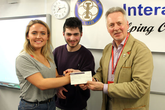 pdc uk accepts 500 donation cheque from the piggott interact club