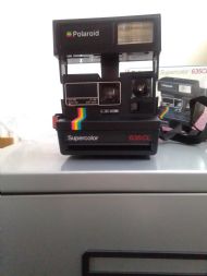 Polaroid instant camera.