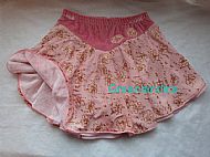 Coral pink ice skating skirt Flat View