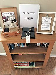 Welcome booklet, guest book, games and books