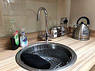Kitchen is stocked with all plates, cutlery and high quality cookware