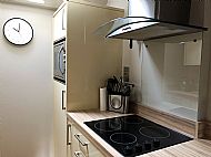 The kitchen is very well equipped with ceramic hob and high quality built in combination oven with microwave and grill.
