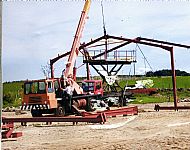 The first shed going up August 2004