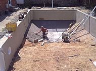 Laying reinforced concrete base