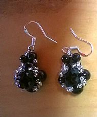 Tudor rose drop earring